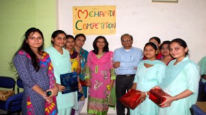 Winners of Mehandi competition, posing with Chairman, Rajiv Gandhi Memorial College of Education, Kathua, Anu Dogra and others.