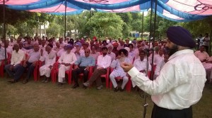 Cong leader Manjit Singh addressing workers’ meeting at Vijaypur on Wednesday.
