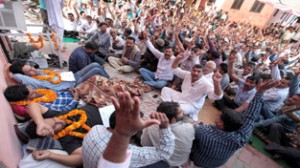 Casual laborers protesting at PHE complex B C Road, Jammu on Monday. -Excelsior/Rakesh
