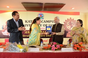 Rector Kathua Campus Prof Neelu Rohmetra presenting memento to JU VC Prof R D Sharma during inaugural function of ANUSHTHA 2014 on Wednesday.