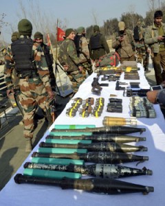 Army and police displaying arms and ammunition recovered from Baramulla on Sunday.  —Excelsior/Aabid Nabi