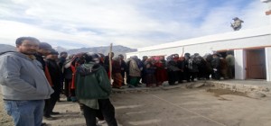 Despite sub-zero temperature, people waiting in queue to cast votes in a polling station near Leh town on Tuesday.
