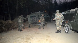 Army personnel during encounter with militants in Kulgam on Thursday. -Excelsior/ Sajad Dar