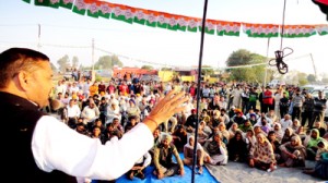 Cong Ex-MP Madan Lal Sharma addressing public rally in Vijaypur on Thursday.