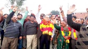 B.R Kundal during door to door campaign in R.S Pura on Saturday.