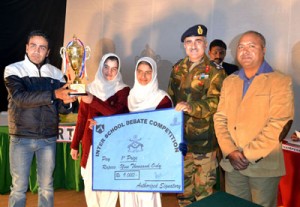 The winners posing for group photograph along with officials of Army’s 46 Rashtriya Rifles Unit. 