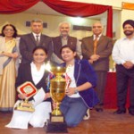 ADGP S P Vaid JU VC Prof R D Sharma, DGP (Retd) Ashok Bhan and others posing for group photo with winners of Veeranna Aivalli Memorial Running Trophy on Saturday. -Excelsior/Rakesh