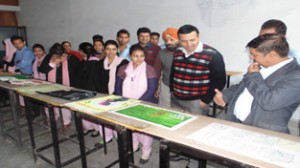 Paintings being observed by adjudicators during Annual Sports Week at Govt Polytechnic in Jammu.