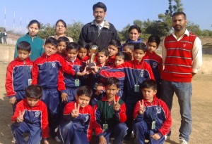 Kho-Kho teams posing along with officials at DPS Udhampur.