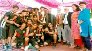 Winners of Basketball tournament posing along with dignitaries at KCPS in Jammu.