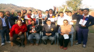 The winners of 5th Rajouri district Indian Style Wrestling championship posing for group photograph on Sunday.