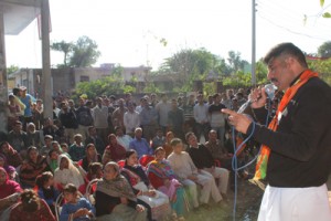 Pawan Khajuria addressing public meeting in outskirts of Udhampur on Thursday.