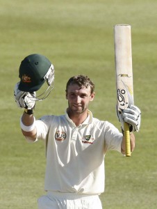 Australia’s Philip Hughes who passed away today celebrates his century during the third day of the second cricket test match against South Africa in Durban earlier this year.