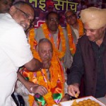 Prof Chaman Lal Gupta being offered sweets by Avinash Rai Khanna and Ashok Khajuria after joining party at Jammu on Saturday.  -Excelsior/Rakesh