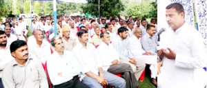Minister for PHE, Sham Lal Sharma addressing a gathering at Akhnoor on Tuesday.