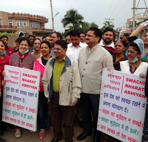 Div Com Jammu Shantmanu and JMC Commissioner Kiran Wattal leading Swachh Bharat Abhiyan at Jammu on Saturday.