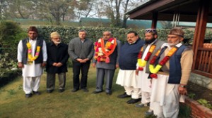 Chief Minister and NC working President Omar Abdullah and others welcoming Ch Shamsher Haqla into party fold at Srinagar on Friday.