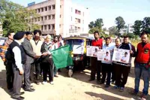 District Election Officer A K Sahu flagging off Auto Poster Rally.