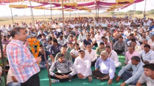 MLA, Ashwani Sharma addressing a party meeting at Bishnah on Sunday.