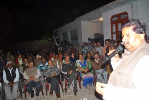 Minister for Housing Raman Bhalla addressing public meeting on Wednesday.