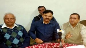 PoJK refugee leaders addressing a press conference at Miran Sahib on Monday.