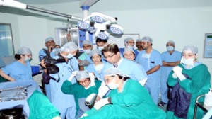 Doctors and para-medical staff during live surgeries in Jammu on Sunday.