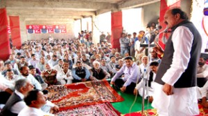 Former Minister S S Slathia addressing gathering at Bari Brahmana on Friday.