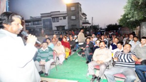Minister for Housing Raman Bhalla addressing public meeting at Jammu on Tuesday.