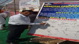 Deputy Commissioner Jammu, A K Sahu during signature campaign.