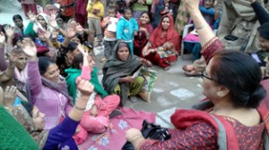 MLA Bimla Luthra addressing a public meeting in Jammu East constituency.