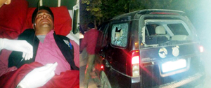 Injured BJP candidate from Nowshera, Ravinder Raina and his damaged vehicles at Nowshera on Friday.