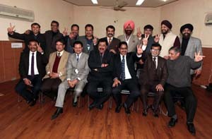 Newly elected Executive Committee members of Amar Singh Club with outgoing Secretary and others.—Excelsior/Rakesh