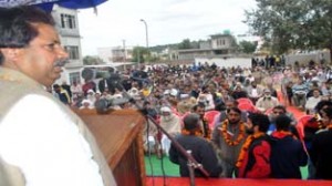 Minister for Housing Raman Bhalla addressing election meeting on Wednesday.