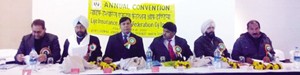 Chief guest DS Shukla and other dignitaries at LIC agents’ annual convention in Jammu on Sunday. 