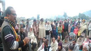 BJP candidate Dr Nirmal Singh addressing election rally in Billawar constituency.