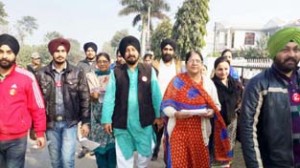 NC candidate Surinder Singh Bunty campaigning in Gandhi Nagar constituency on Wednesday.