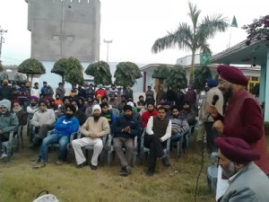 PDP candidate Amrik Singh Reen addressing a public meeting in Gandhi Nagar on Tuesday. 