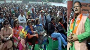 BJP candidate for Gandhi Nagar Kavinder Gupta addressing election meeting in Sainik Colony on Friday.