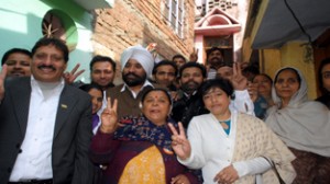Congress candidate for Jammu West Surinder Singh Shingari, along with his supporters during door-to-door campaign on Friday.