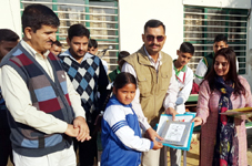Students being felicitated during prize distribution function organized by Helpage India.