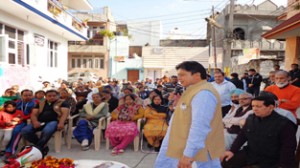 BJP candidate Rajesh Gupta addressing election meeting in Mohalla Dalpatian on Sunday.