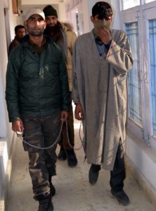 Murder accused in police custody. —Excelsior /Younis Khaliq