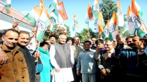 Cong candidate Balwan Singh taking out road show at Marh on Sunday.