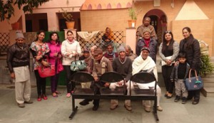 Women’s Hub members and inmates of Old Age Home posing for group photograph. 
