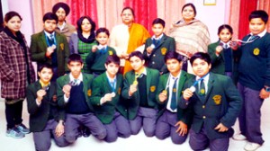 Medal winners of DPS Jammu posing for a group photograph.