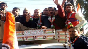 Cong candidate Shabir Khan taking out rally in Rajouri.