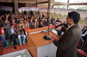 DEO Jammu Ajeet Kumar Sahu delivering address during voter awareness workshop at Chamber House on Saturday.