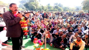 Union Minister Dr Jitendra Singh addressing a public meeting during an election tour of Billawar Assembly constituency on Sunday.