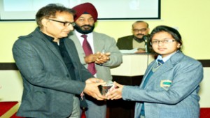 VC of CUJ presenting memento to one of the participants in programme in University on Wednesday.