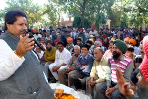 Minister of Housing Raman Bhalla addressing election meeting on Sunday.